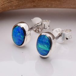 S865 - 925 silver oval blue opal stud earrings