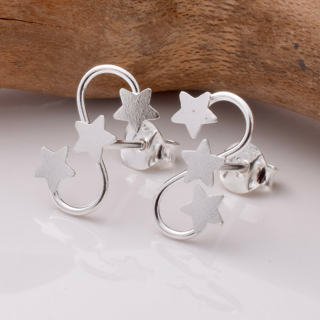 S912 - 925 silver star swirl stud earrings