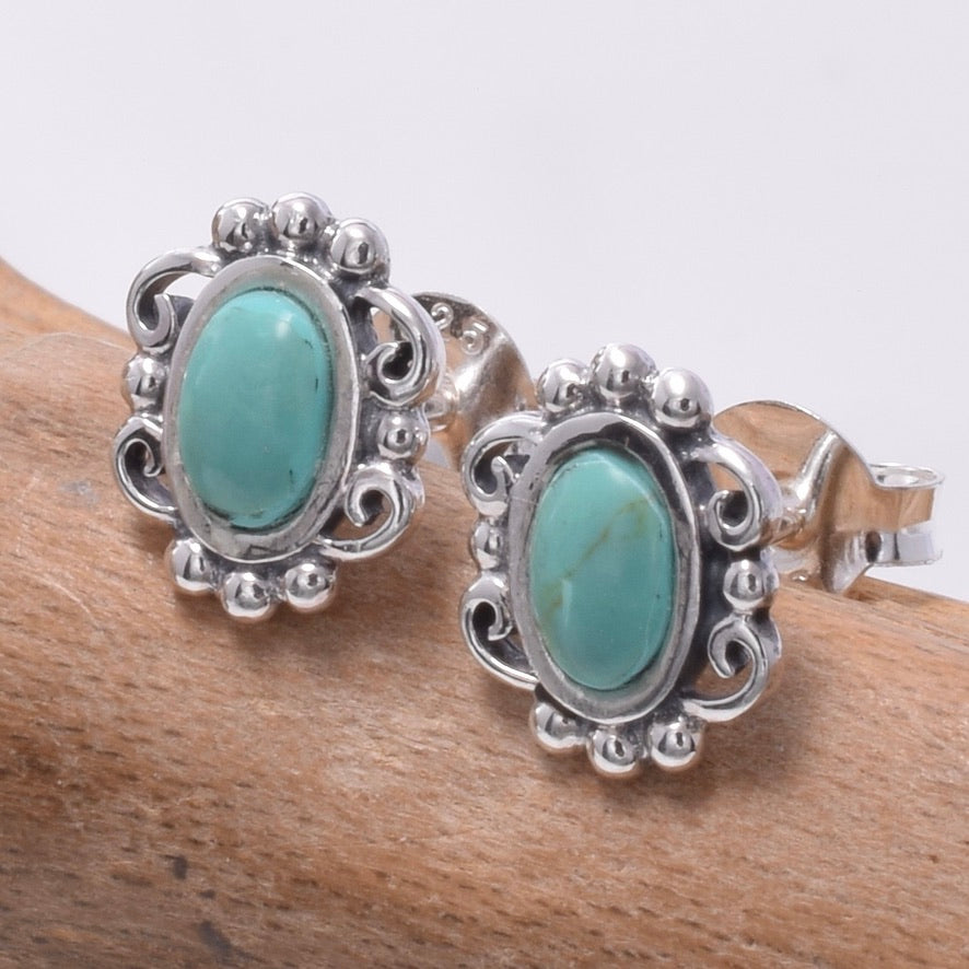 S686 - 925 silver and recon turq stud earrings