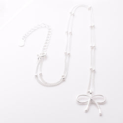 P1166 - 925 silver necklace with bow pendant