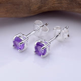 S1081 - 925 silver amethyst clawset stud earrings