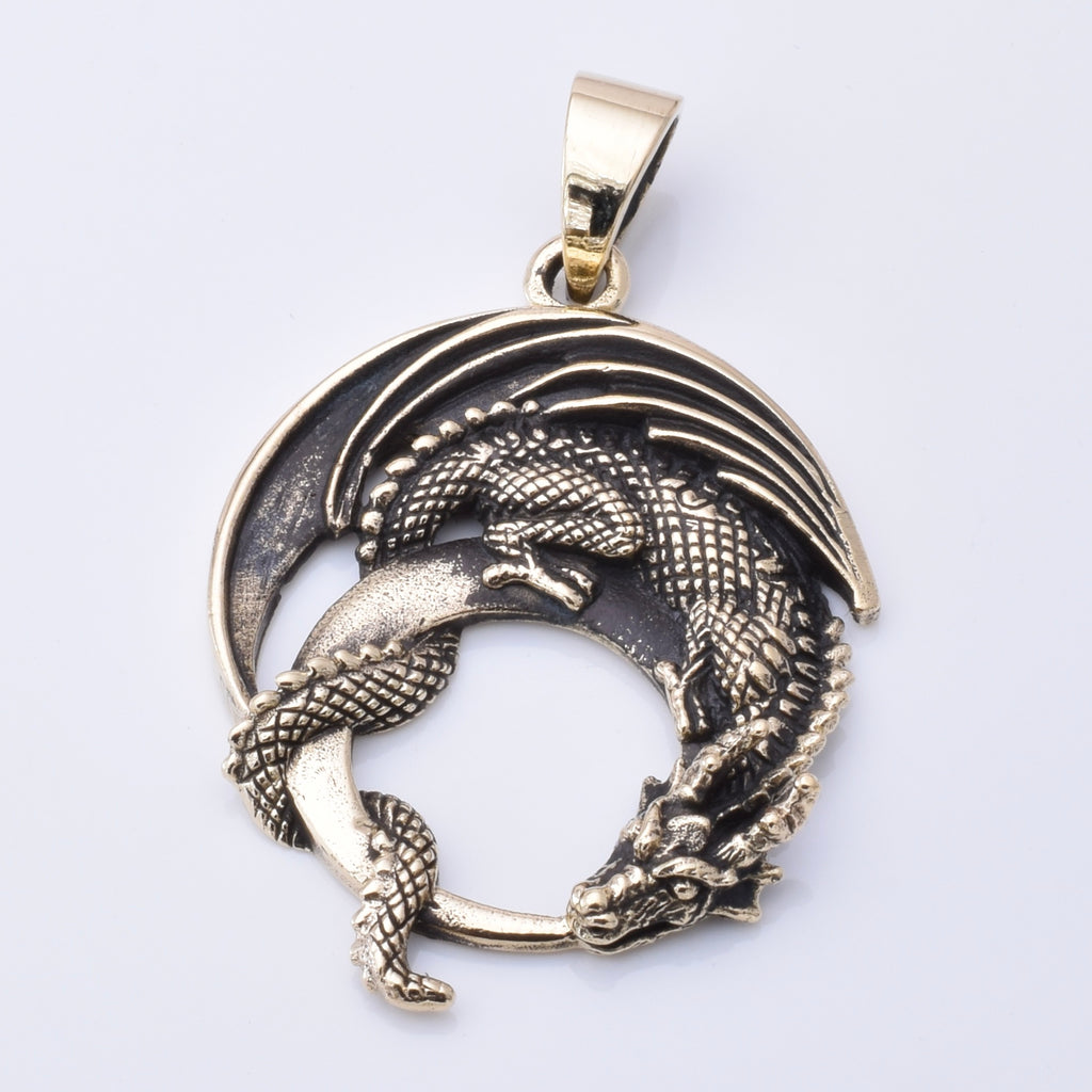 P1290 - Solid bronze curled dragon pendant