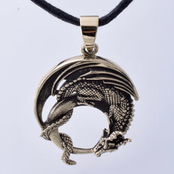 P1290 - Solid bronze curled dragon pendant