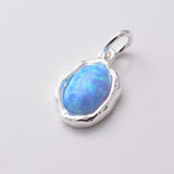 P1075 - 925 silver and recon blue opal pendant