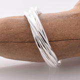 R309 - 925 silver entwined band ring