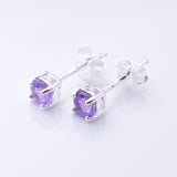 S1081 - 925 silver amethyst clawset stud earrings