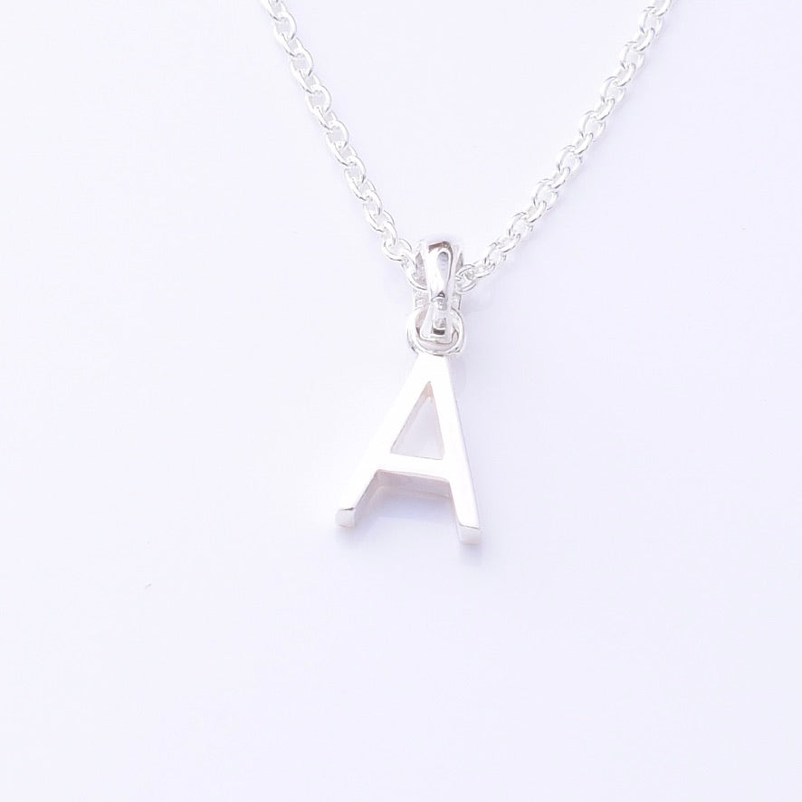P1335 - A 925 silver initial pendant - A