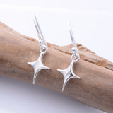 E936 - 925 silver north star earrings