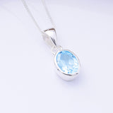 P1361 - 925 silver blue topaz oval pendant