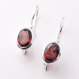 E859 - 925 silver and garnet oval earrings