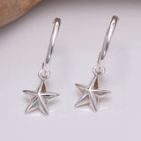 E646 - Silver hoop and star earrings