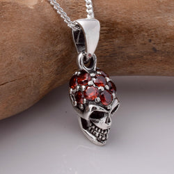 P878 - 925 Silver skull with red CZ stones