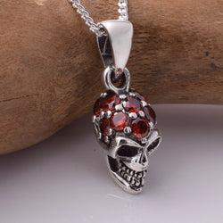 P878 - 925 Silver skull with red CZ stones