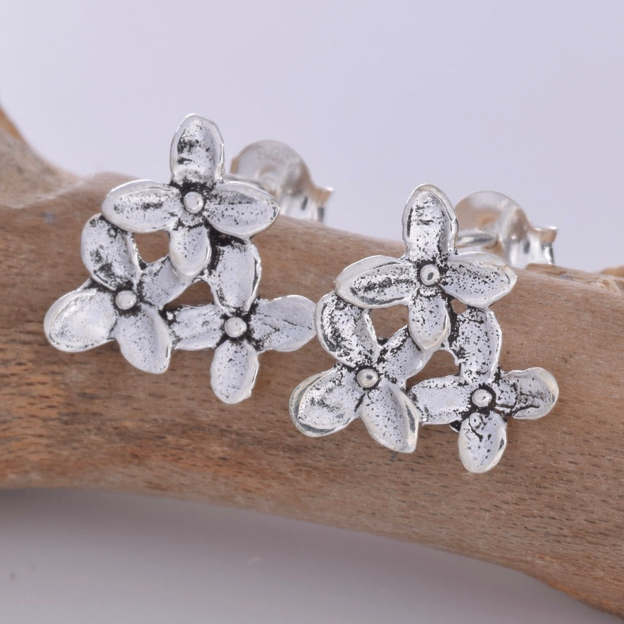 S606 - Silver triple flower stud earrings