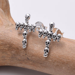 S652 - Silver Cross with skulls stud earrings
