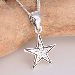 P638 - Silver star pendant