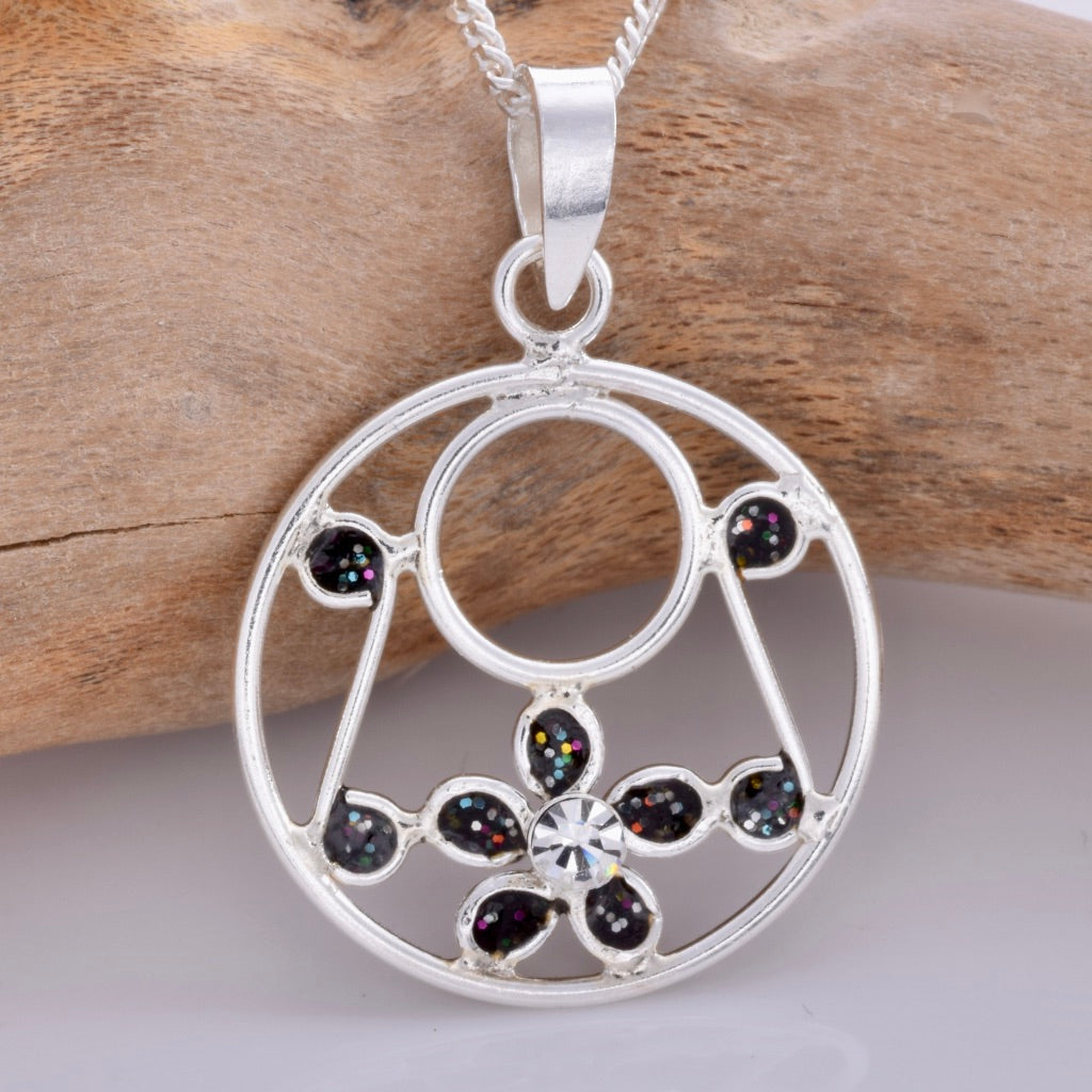 P677 - Black disc and daisy pendant