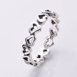 R209 - 925 Silver Band Of Hearts ring