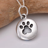 P757 - Silver paw print disc pendant