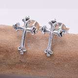 S628 - Ornate silver cross stud earrings