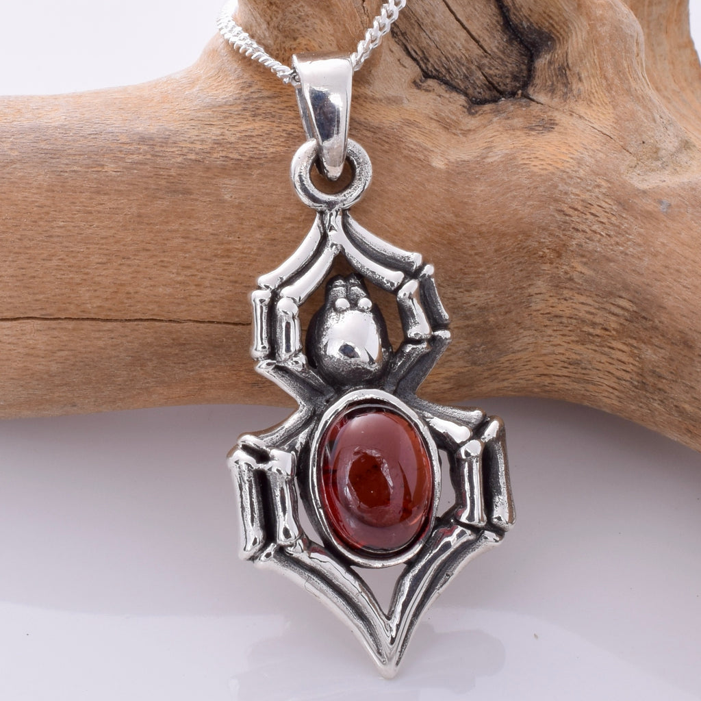 P915 - 925 Sterling Silver and garnet Spider pendant