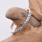R163 - Silver thin band wavy design ring