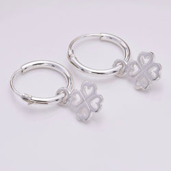 E643 - Silver hoop and four leaf clover