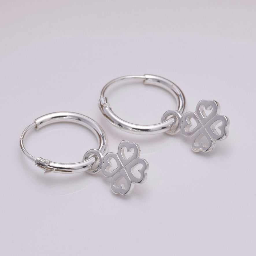 E643 - Silver hoop and four leaf clover
