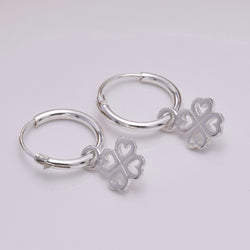 E643 - Silver hoop and four leaf clover