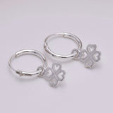 E643 - Silver hoop and four leaf clover
