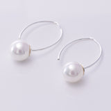 E132 - Imm Pearls on Curved Silver Bars
