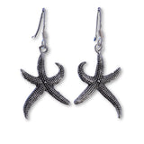 E573 - curly starfish drop earring
