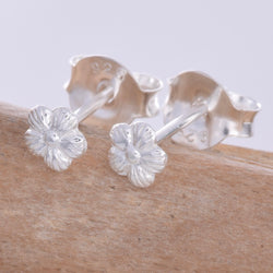 S597 - Tiny silver hibiscus stud earrings