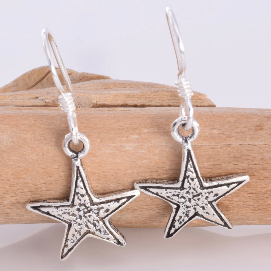 E565 - Silver star drop earrings