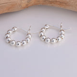 E561 - Silver string of beads hoop earrings 14mm