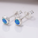 S694 - Round blue opal stud earrings