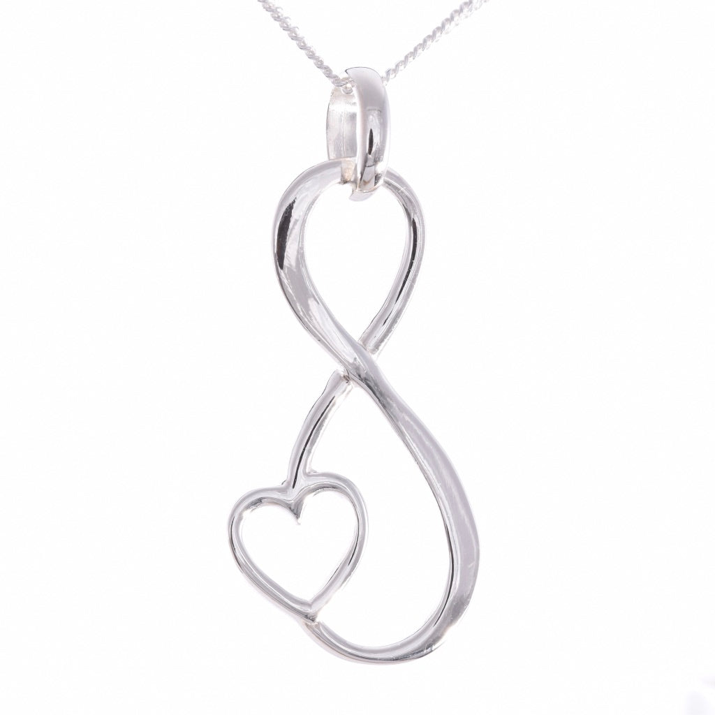 P693 - Large infinity loop with heart pendant – Java Designs