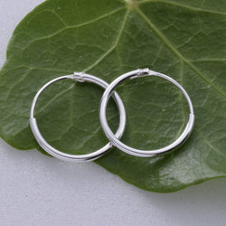 E079 1.2 x 14mm Silver Hoop Earring