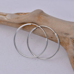 E462 - 1.2 x 25mm Sleeper hoop earrings